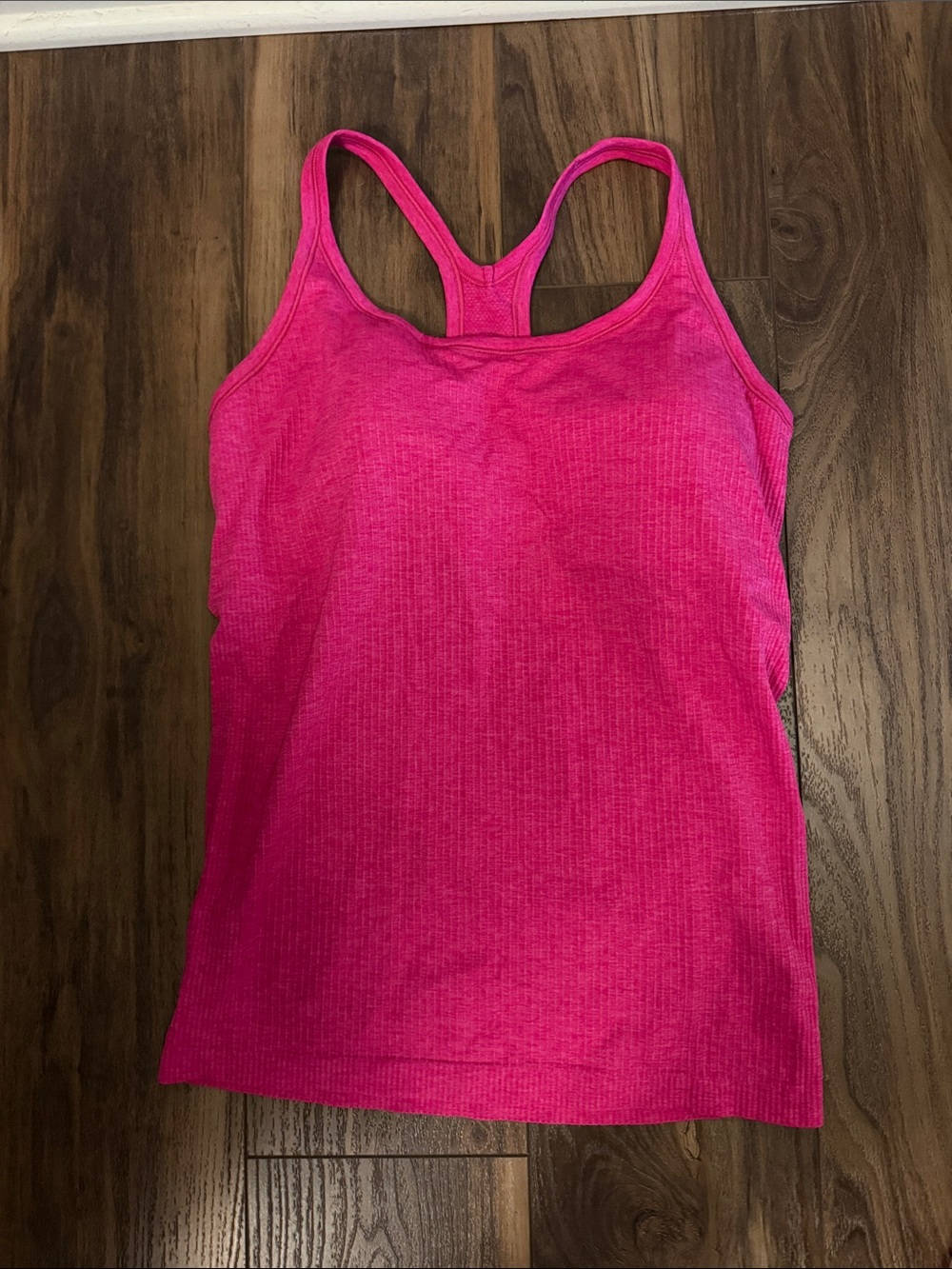 Pink Lululemon Ebb to Street size 12 Tank Top